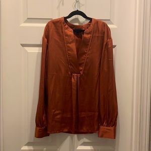 Burnt orange silk blouse